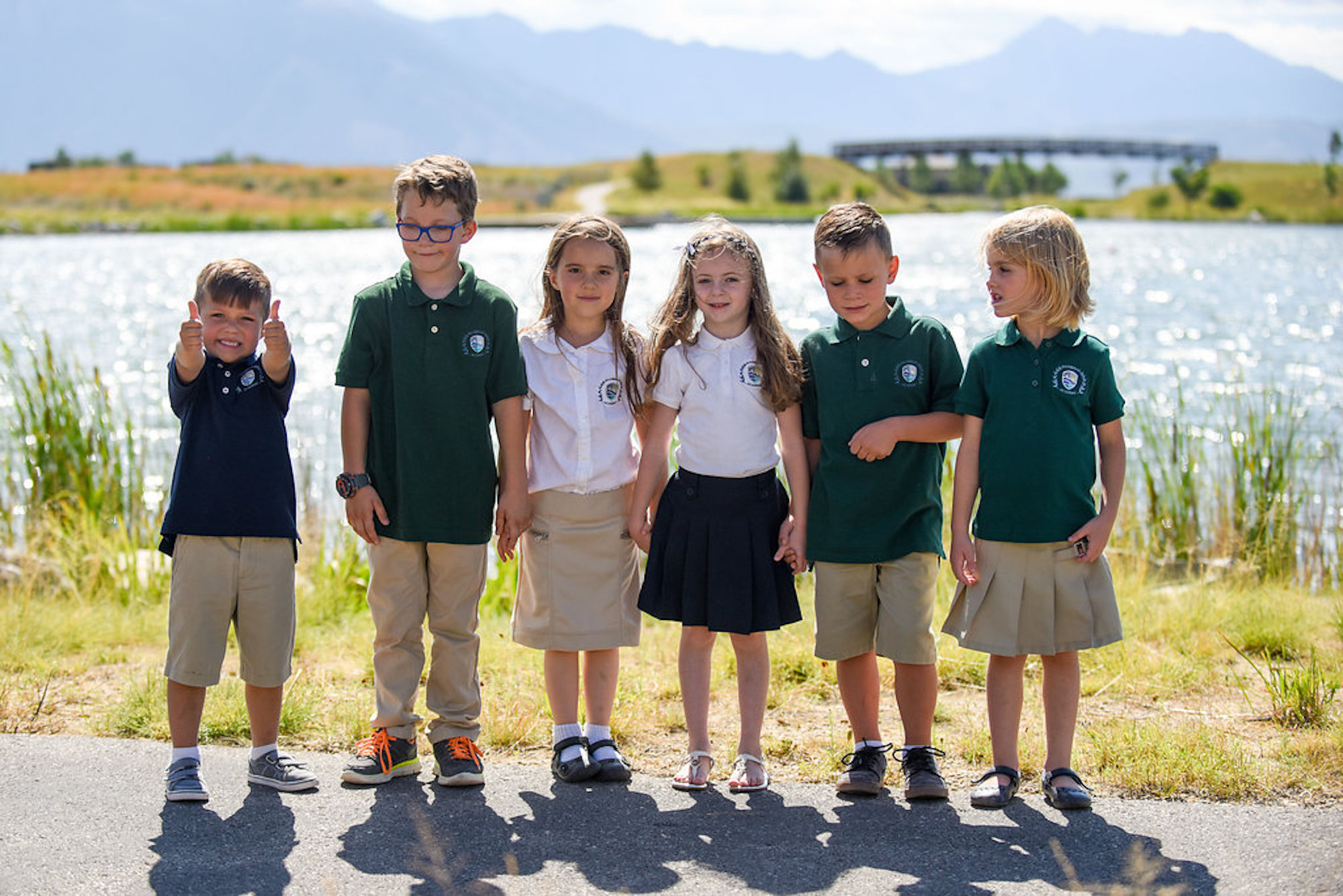 A group of children standing next to each other.